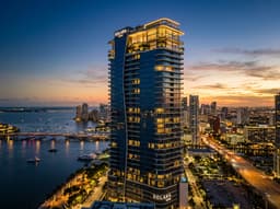 Solara Residences luxury residential tower in Miami at dusk